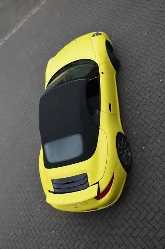 Porsche gelb Draufsicht – Fahrzeugbeschriftung von Münch Werbetechnik Siegen